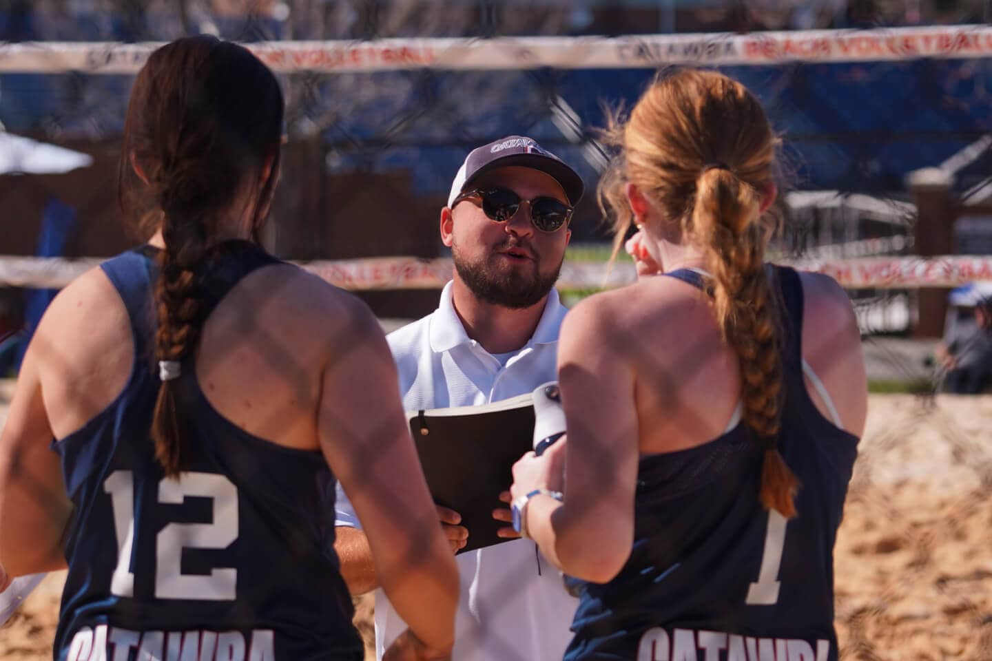 B63 1 Coach talking to players