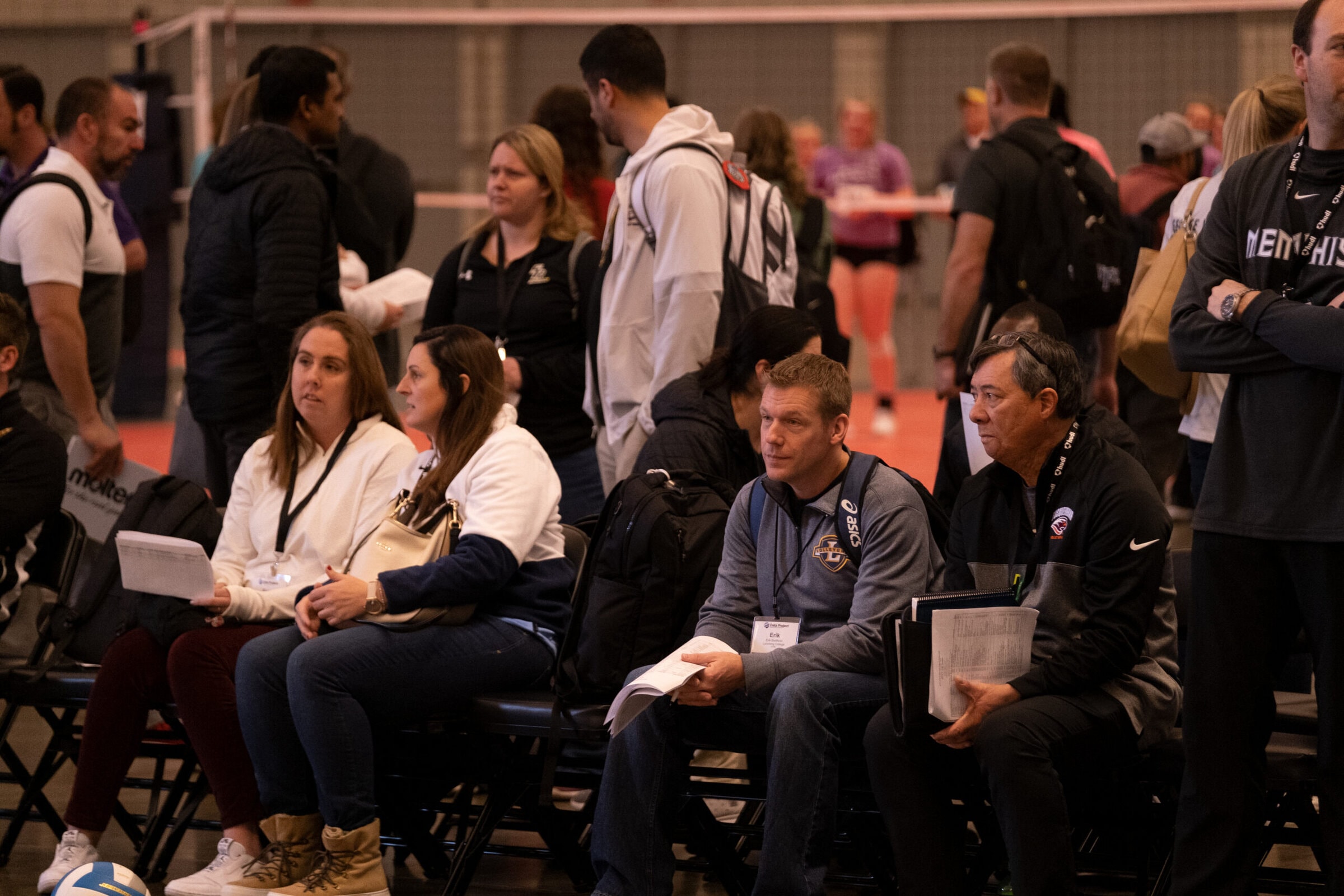 Collegiate coaches watch athletes taking part in AVCA Talent Showcases