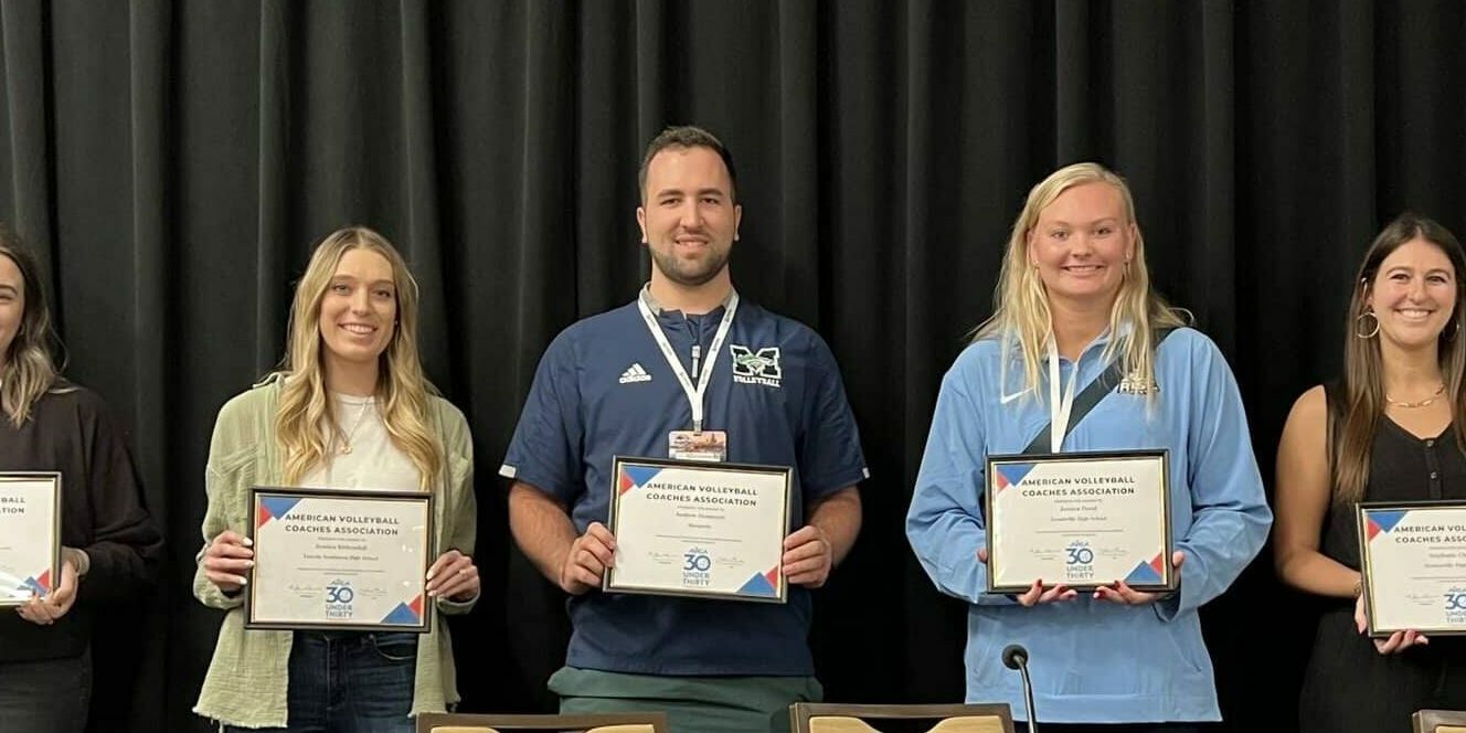 AVCA Award winners holding certificates