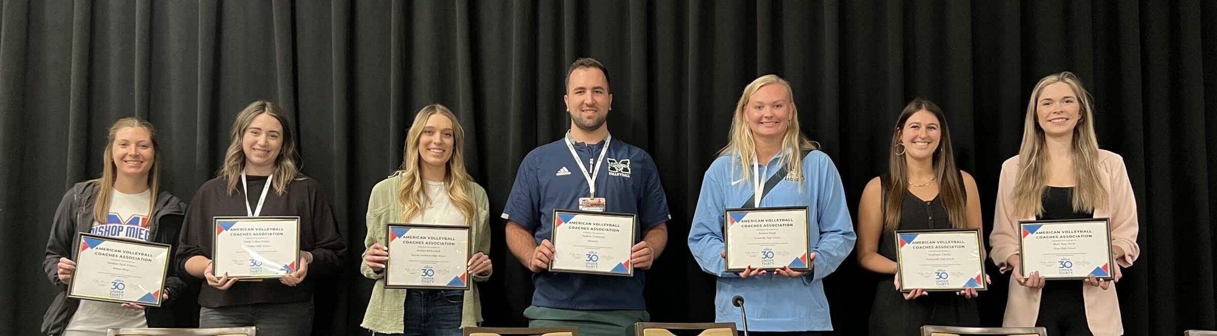 AVCA Award winners holding certificates